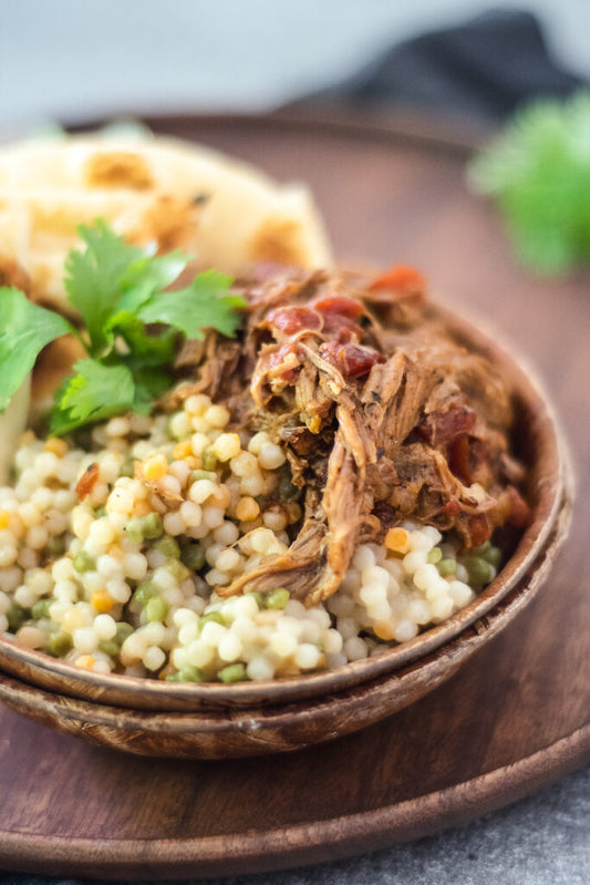 PULLED BEEF OVER ISRAELI COUSCOUS 7" PAN